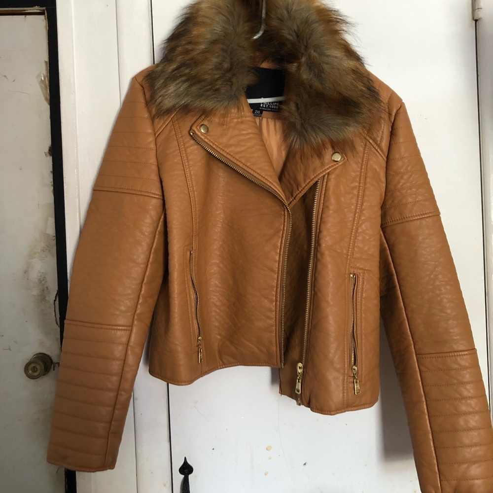Leather jacket with fur top